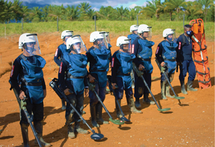 Former FARC-EP combatants specialized in manual clearance technique and medical support of HUMANICEMOS DH, trained in December, 2020.  Image courtesy of UNMAS Colombia and HUMANICEMOS DH.