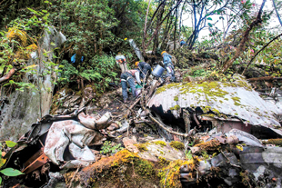 Members of the DPAA conducting search and recovery efforts in the area of a B-24J crash site in Arunachal Pradesh, India. Image courtesy of SSgt Erik Cardenas, U.S. Air Force.