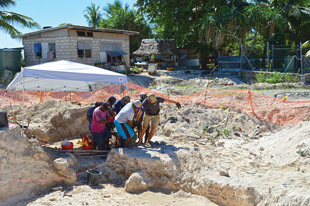 Personnel from the QRF and KPS remove ordnance from the site for disposal.  Image courtesy of GWHF.