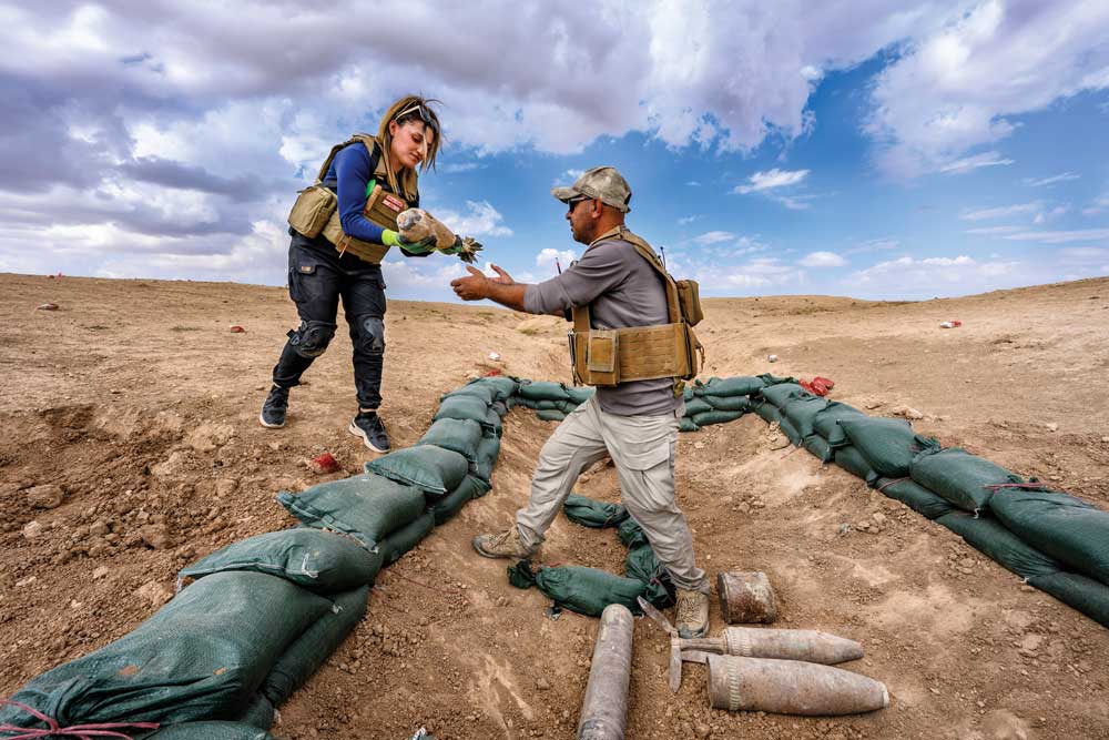 Clearance staff ensure that explosive hazards are removed and temporarily stored safely. Image courtesy of Arne Hodalič/ITF.