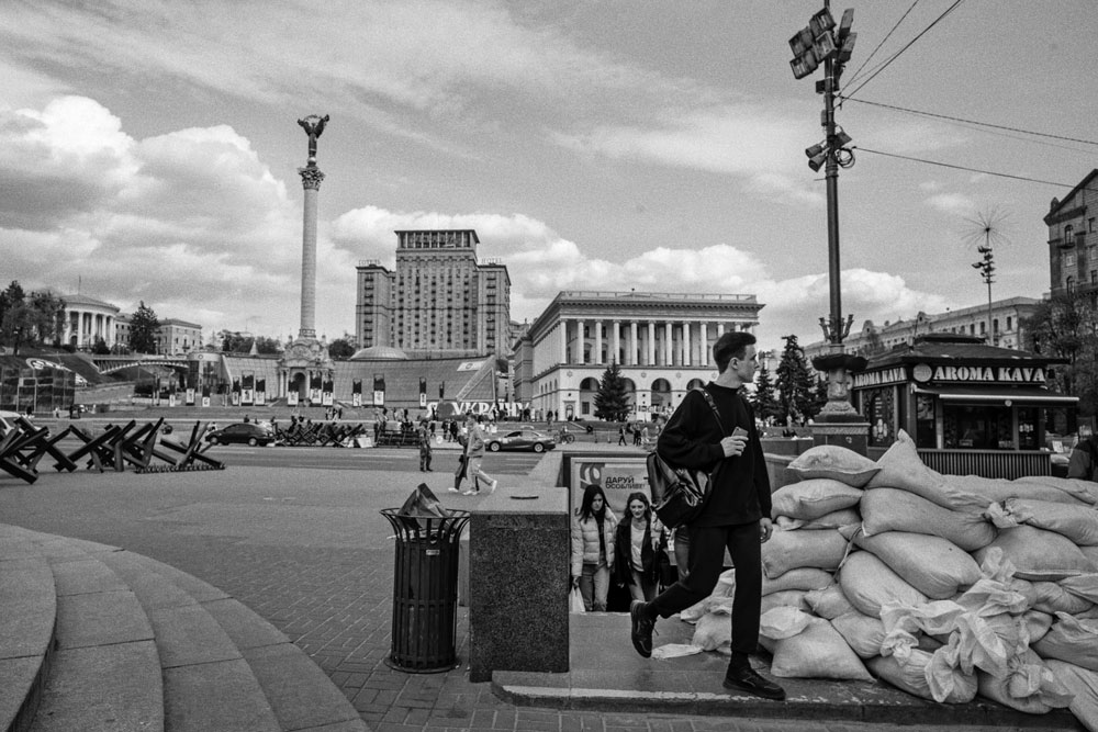 Sandbags protect entrances, and sandbagged positions, barricades, and hedgehog anti-tank obstacles are set up in many parts of Kyiv.