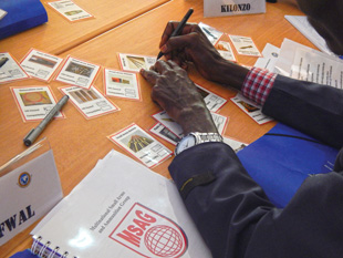 A regional PSSM course participant taking part in and MSAG exercise on ammunition an UN Hazard Classification and compatibility groups.