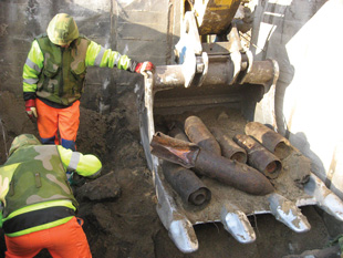 Unearthing vast quantities of explosive remnants of war (ERW). More than eighty unexploded German WW2 aircraft bombs were discovered in the center of a Norwegian village.  Image courtesy of Geir P. Novik.