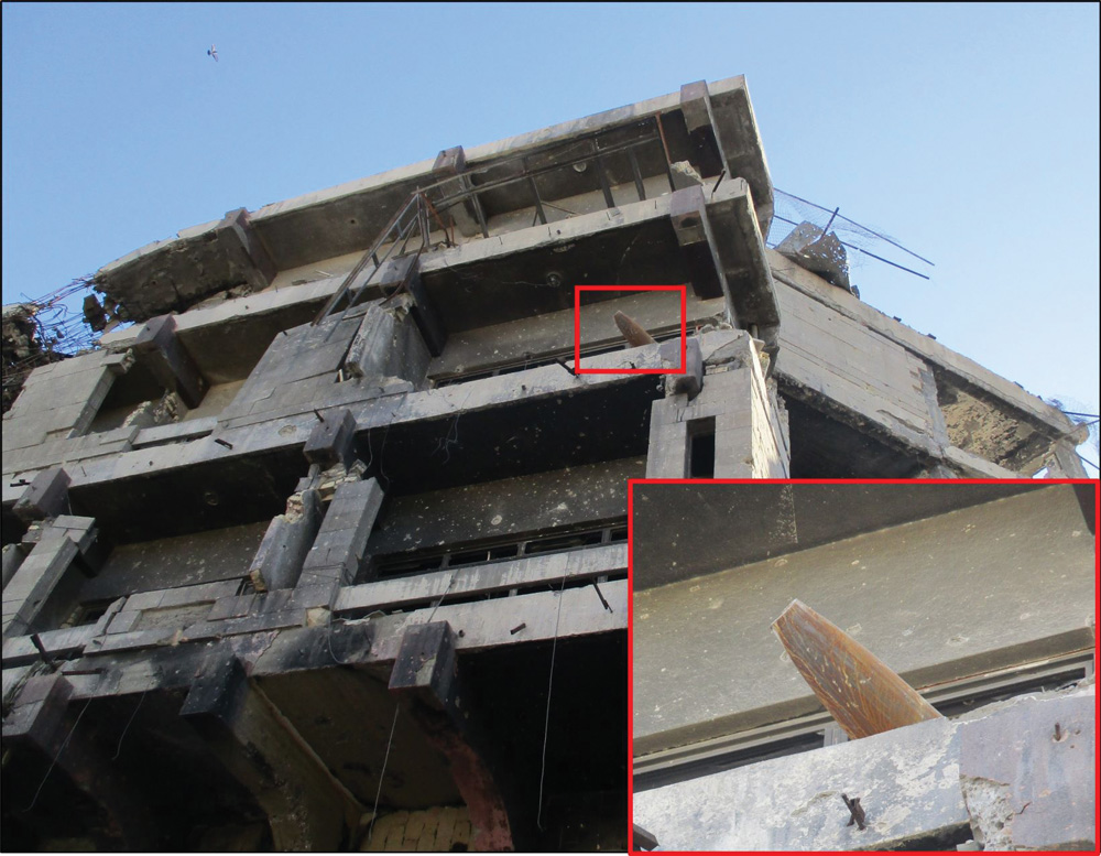 A 500 lb. bomb located on the fourth floor of a building with the stairs mostly destroyed, West Mosul, Iraq.