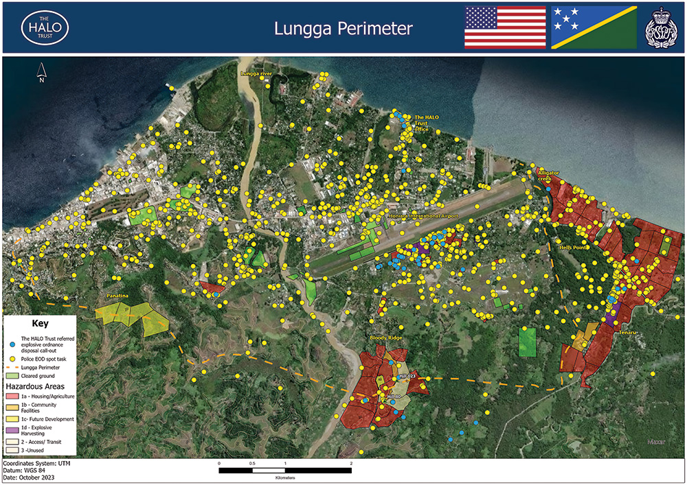 Satellite image of Lungga Perimeter, showing yellow dots that indicated explosive ordnance disposal work around vegetated and populated areas.