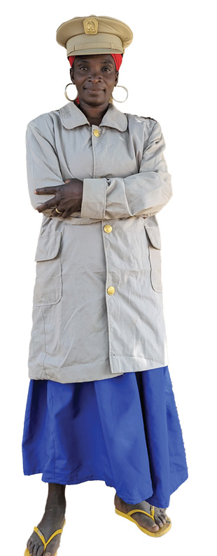 Woman wearing a police hat with her arms crossed in front of her chest