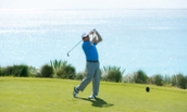 Alumnus Derek Sprague playing golf - 2014