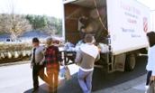 Students loading the truck with donations for the 2013 Brent Berry Food Drive