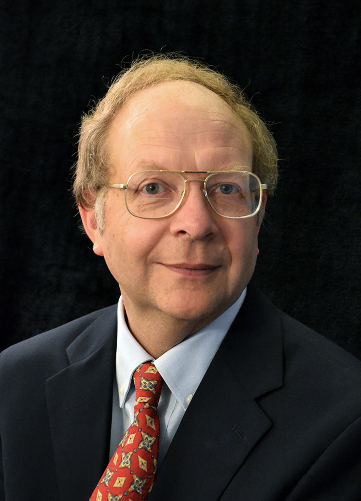 Dr. William C. Wood, Economics