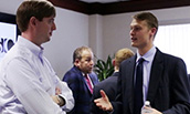 Two students having a discussion during the Internal Sales Competition