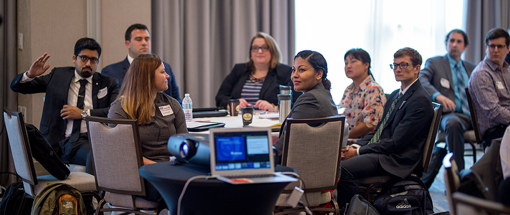 ELMBA students engaging a group discussion during orientation