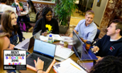 Students collaborating in a table in Zane Showker Hall