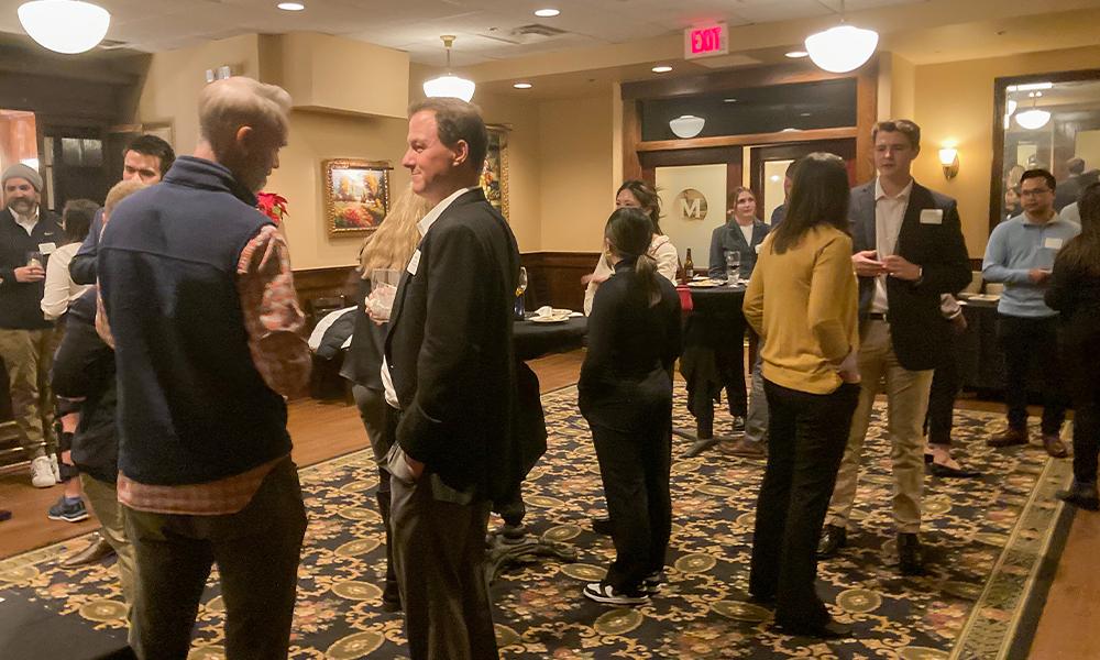 College of Business students networking with alumni group, JMU Federal Dukes, as a part of the Washington, D.C. Career Trek