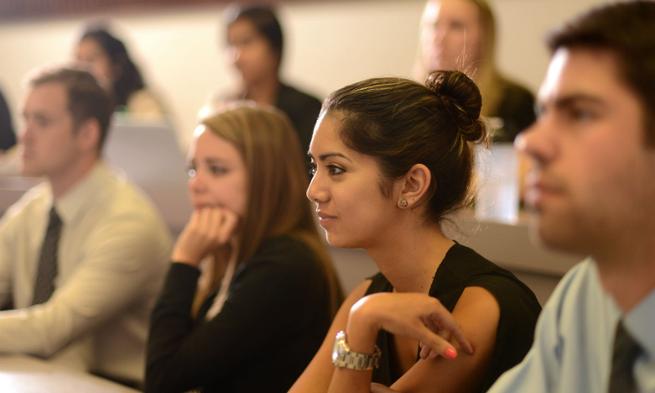 Students listen intently to a lecture in JMU's Showker Hall