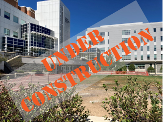 photo of lawn in front of SSC with "under contruction"