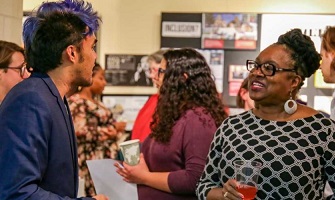 photo of student and faculty networking