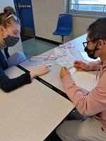 photo of students tutoring