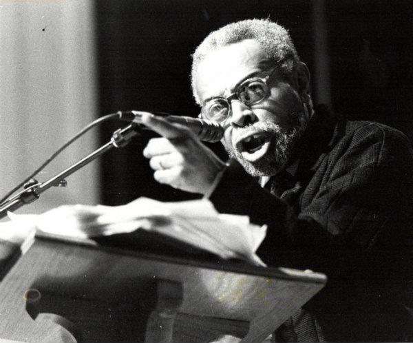 Amiri Baraka reading at 1994 Furious Flower Poetry Conference (photo by C. B. Claiborne)