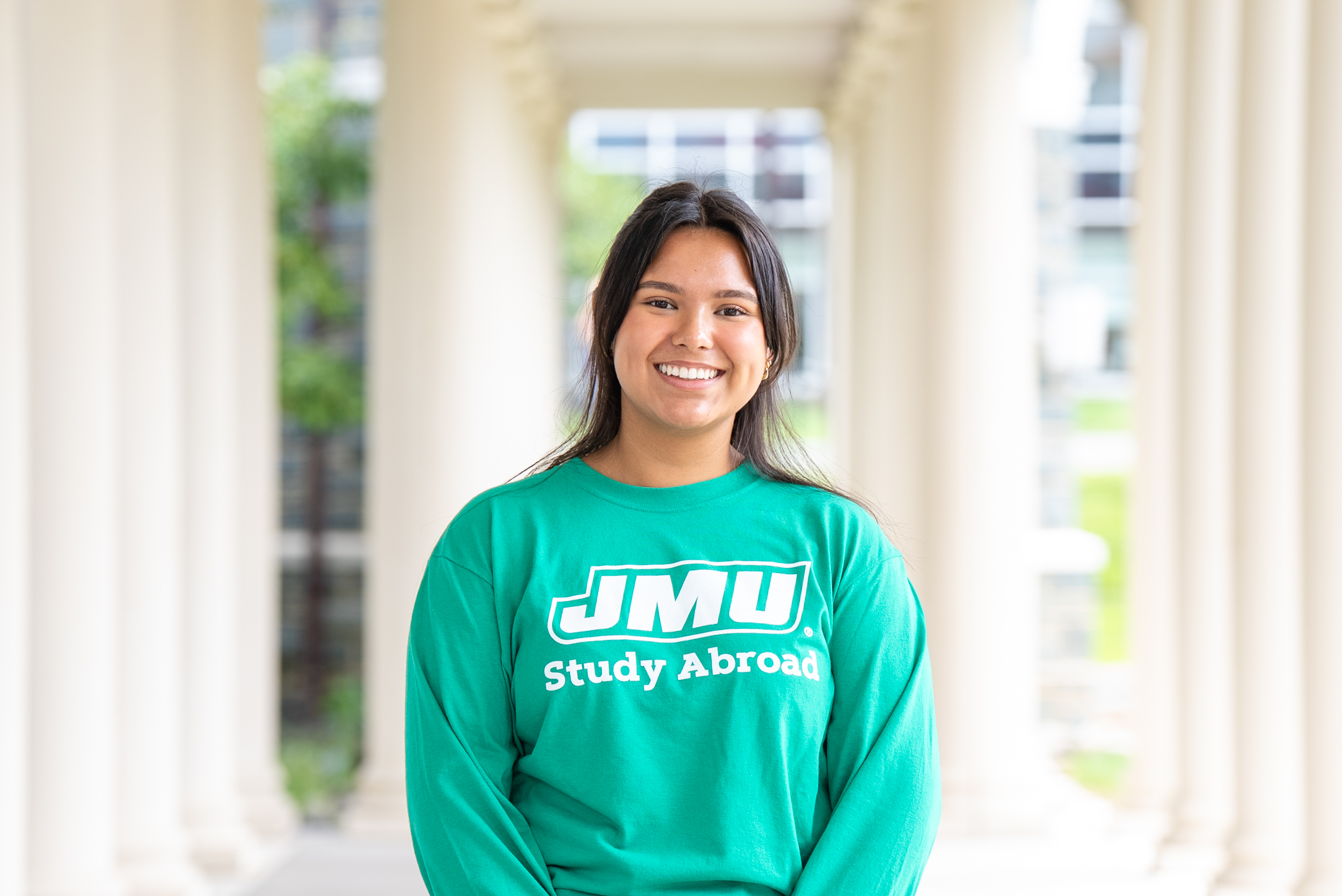 female advisor in green shirt