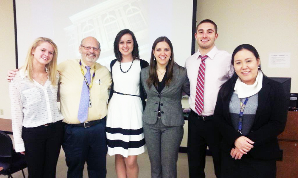 Carolyn and Taylor of University Club visit Rev