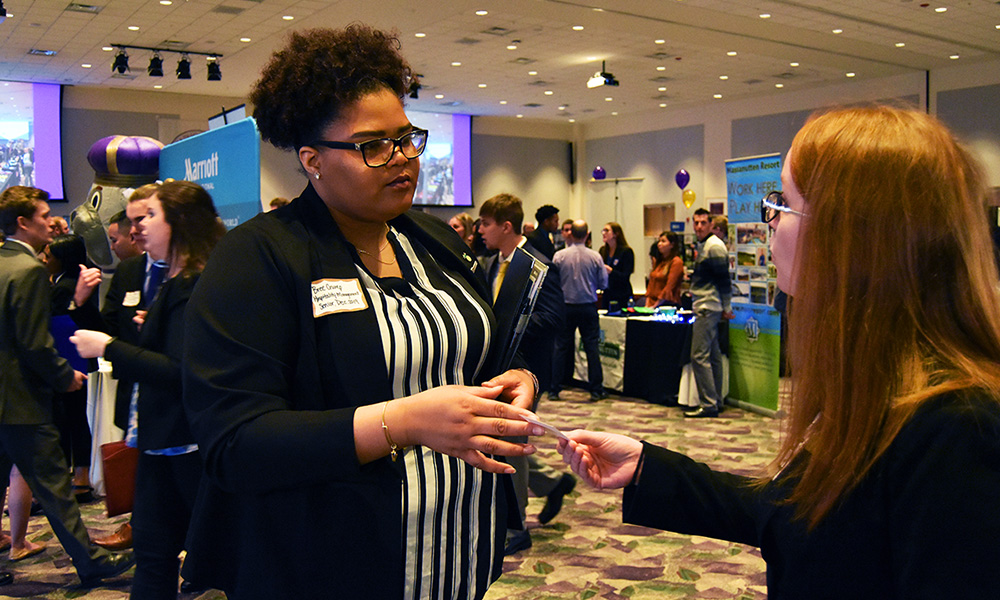 Student talks to a recruiter at the 2019 Career Fair