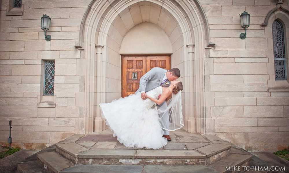 Morgan and Josh Wells kissing in front of church - March 2016 - Mike Topham