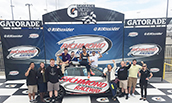 SRM Students posing in the Richmond International Raceway Victory Lane - 2017