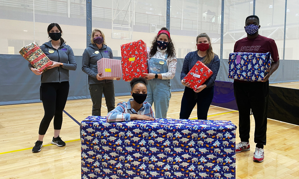 Students with wrapped gifts