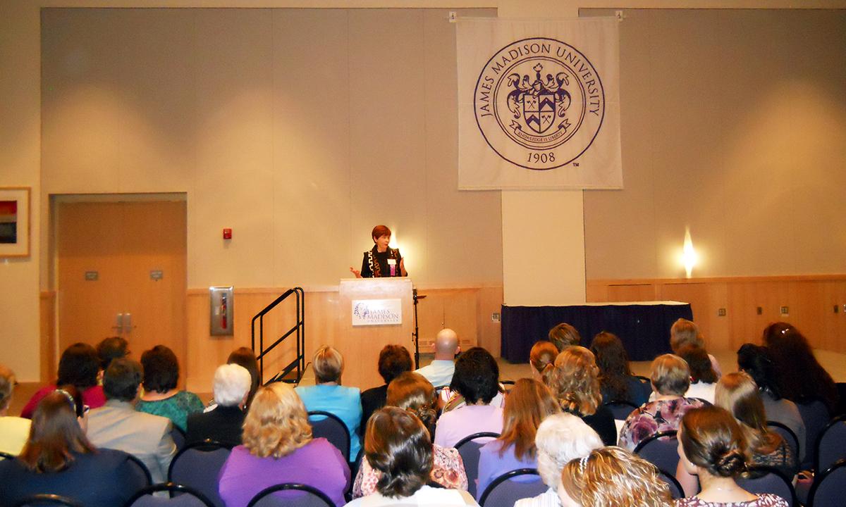 Dr. Nancy Falk speaking at Pi Mu Professional Day