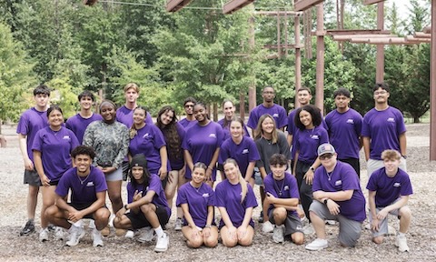 A group of business bound students in jmu shirts