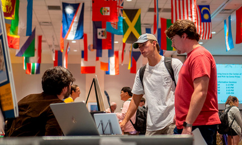 Students learn information about study abroad programs at the Study Abroad Fair.