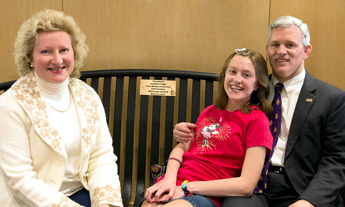 Faculty and staff presented the Algers with a park bench to be placed in the Edith J. Carrier Arboretum in their honor.