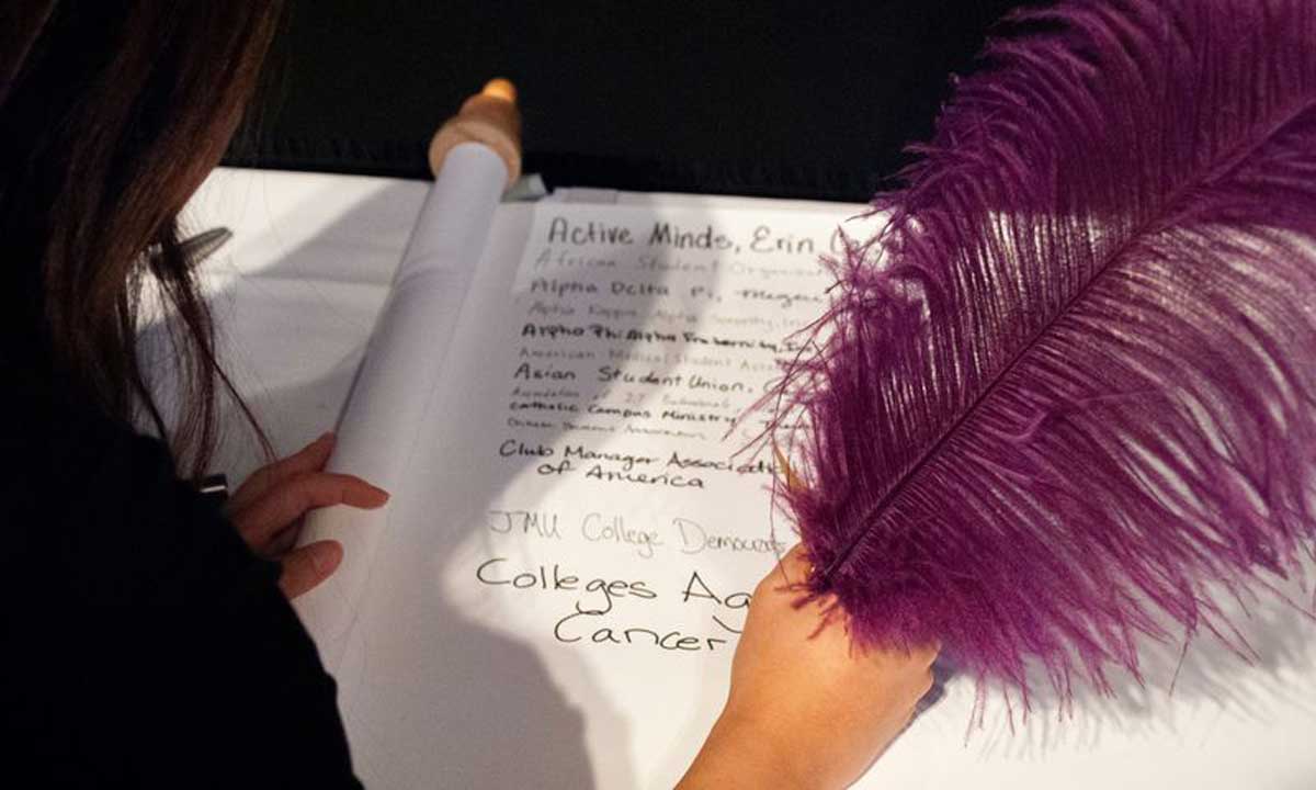 Students representing JMU's 300+ clubs and organizations lined up to sign the scroll commemorating President Alger's Inauguration.