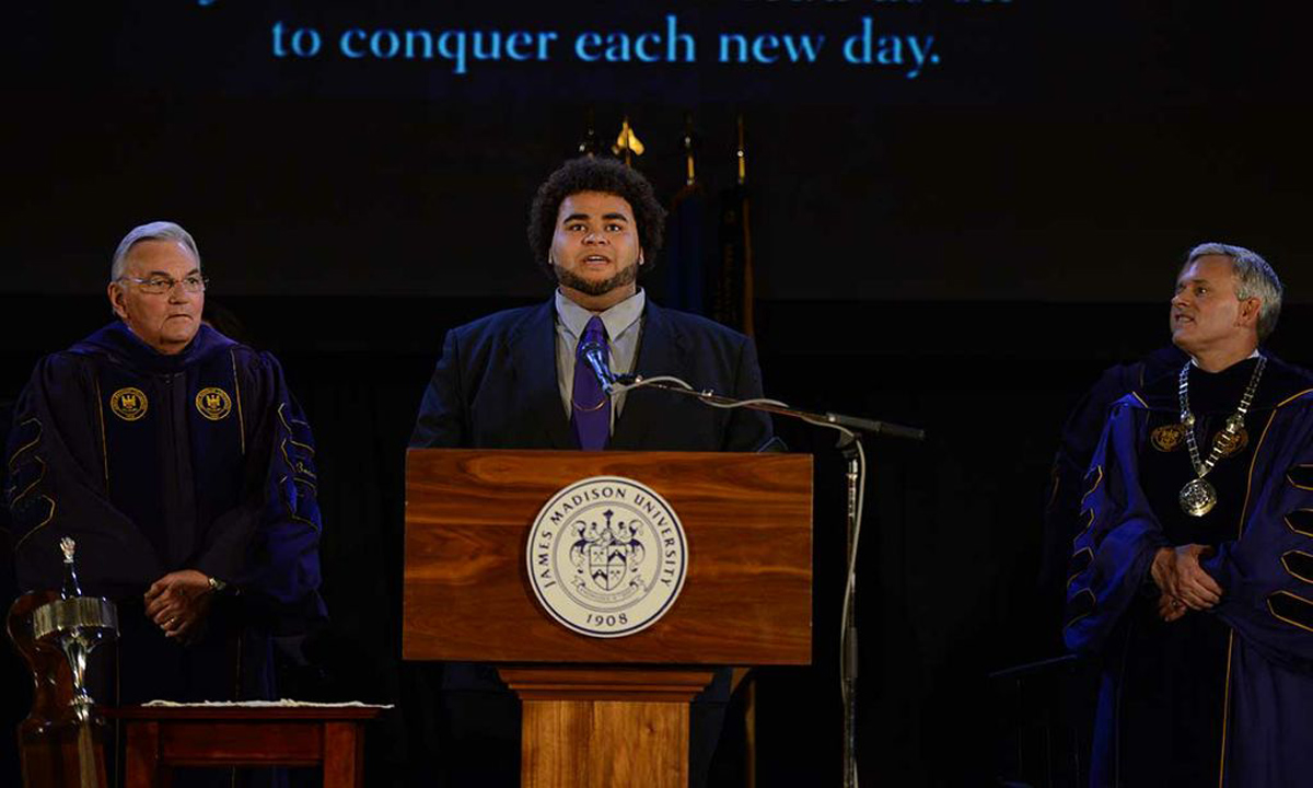 Elliott Paige ('13), music major, sings "Alma Mater"