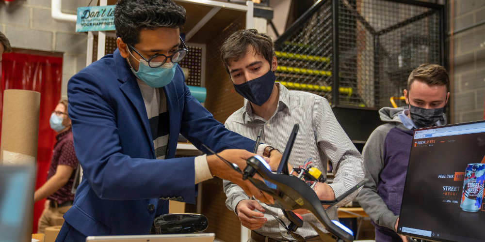 Students prep their drone for flight