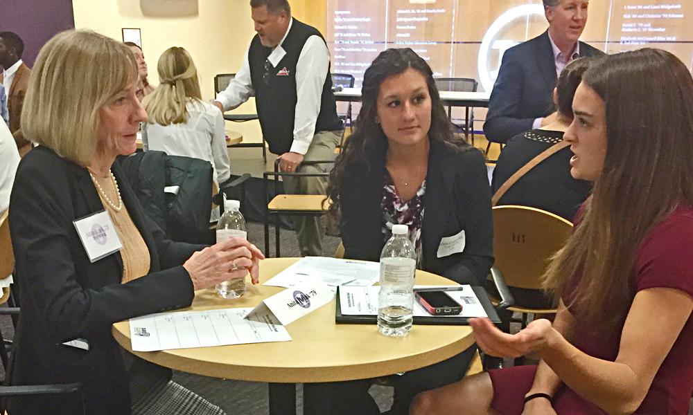 Anita Hyink, Alicia Cooperman and Olivia Lehman sitting at table