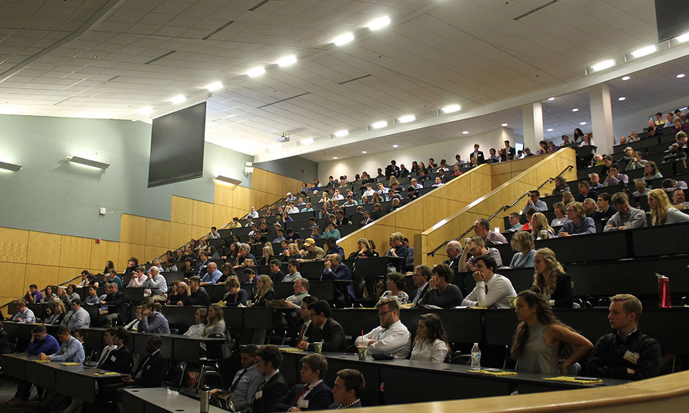 Big crowd in auditorium listens to presentation