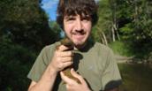Andy Loudon holding hellbender salamander