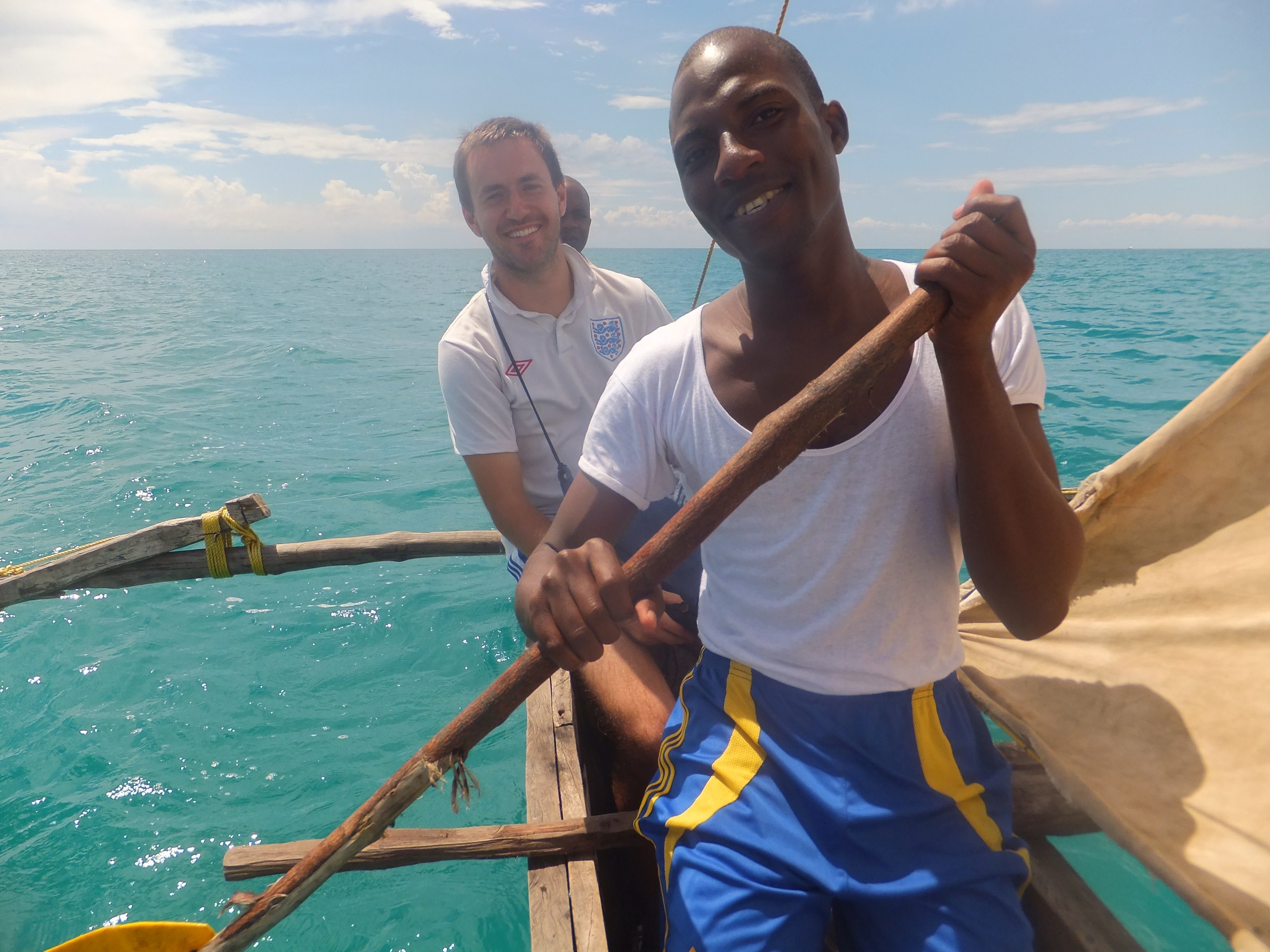Boren Scholar Andrew Reese in a dugout canoe in Africa.