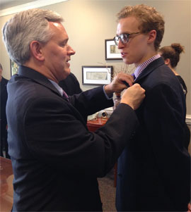 President Alger pinning Fellow Timothy Moore