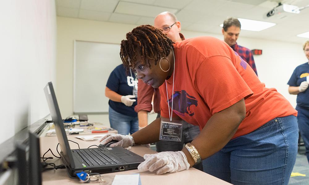 Photo of teachers at computers