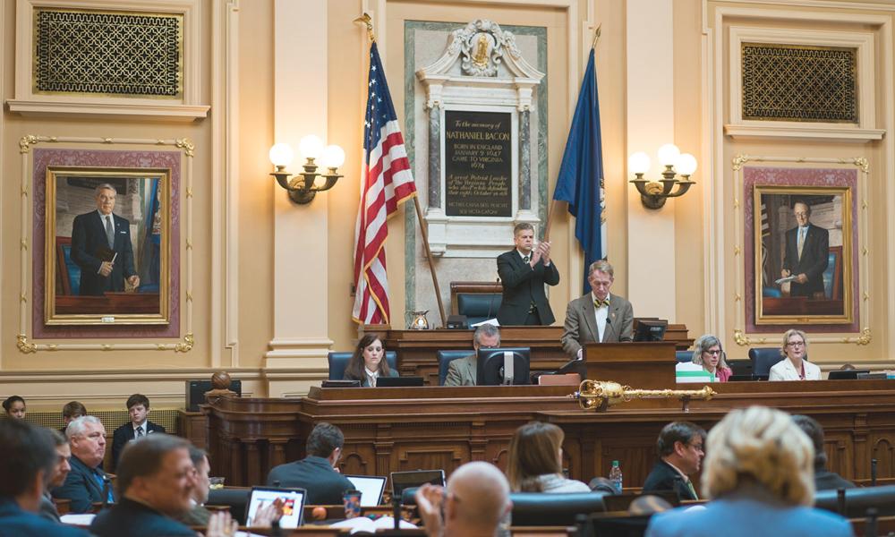 Kirk Cox applauding from Speaker's desk in House of Delegates chamber