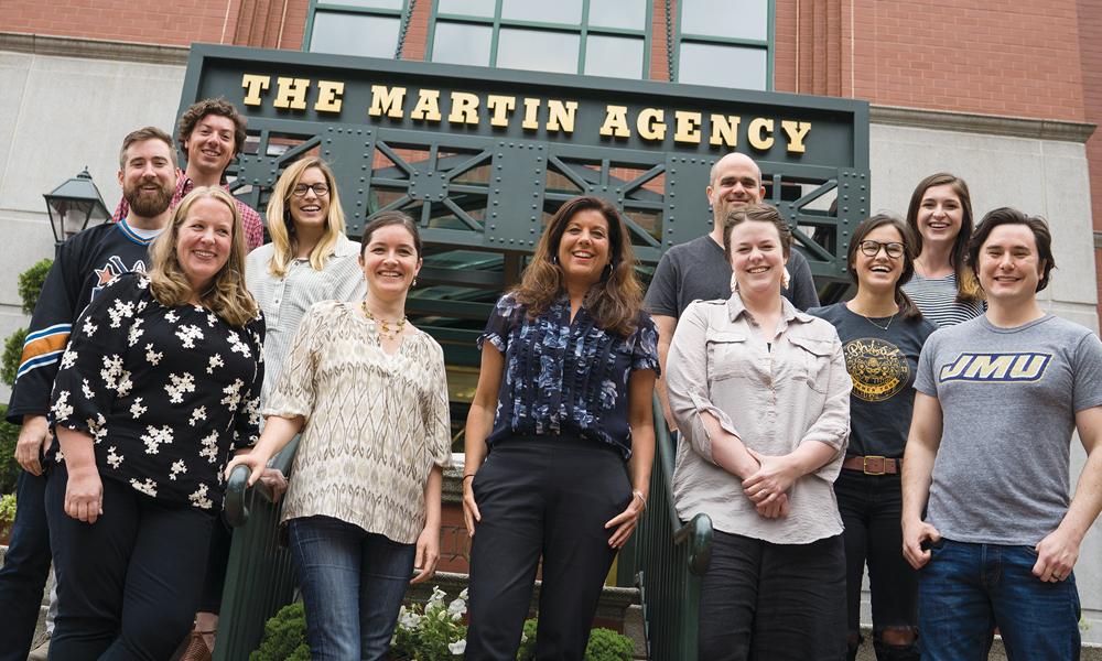 Group photo of 11 JMU Dukes who work at The Martin Agency
