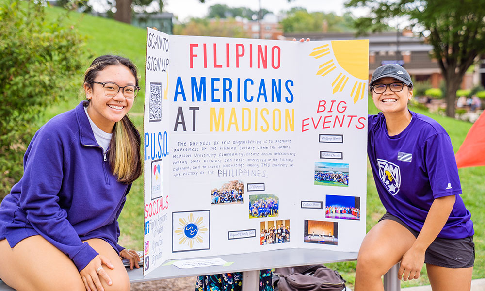 Students at a display at the International Bazaar