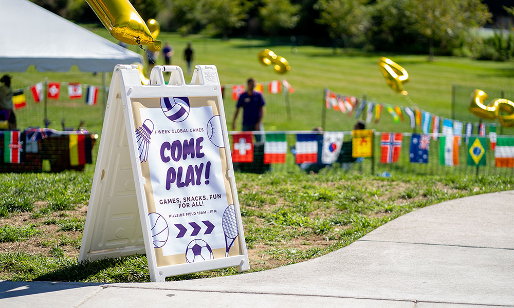 Sign on sidewalk for global games event