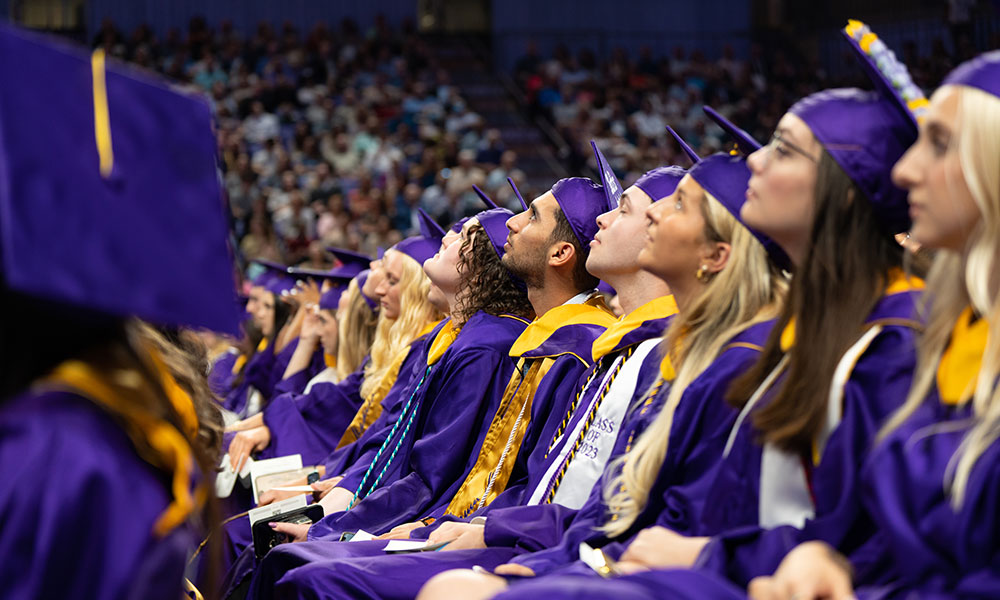 graduates looking up