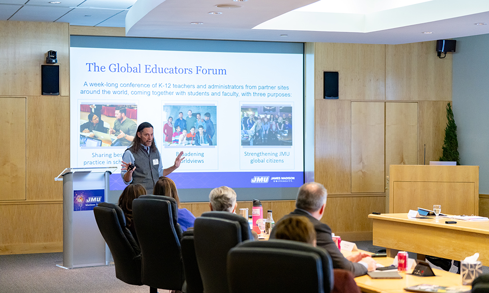 Professor presenting at Madison Trust.