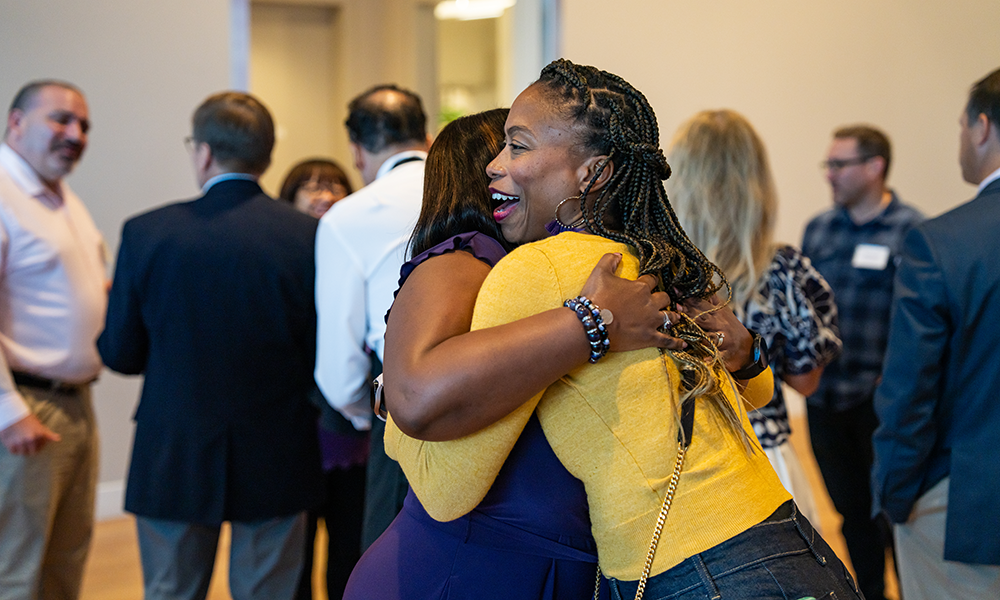 Alums Hugging