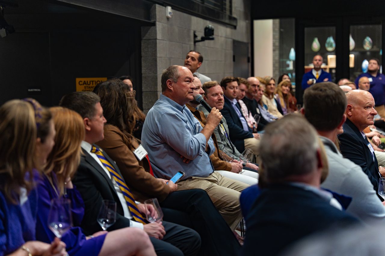 President Jim tour in Norfolk, Virginia, with alumnus Matt Sargent