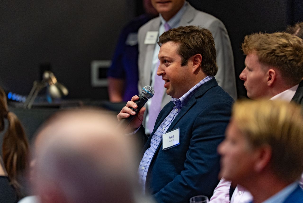 President Jim tour in Norfolk, Virginia, with Fred Rose (’09)